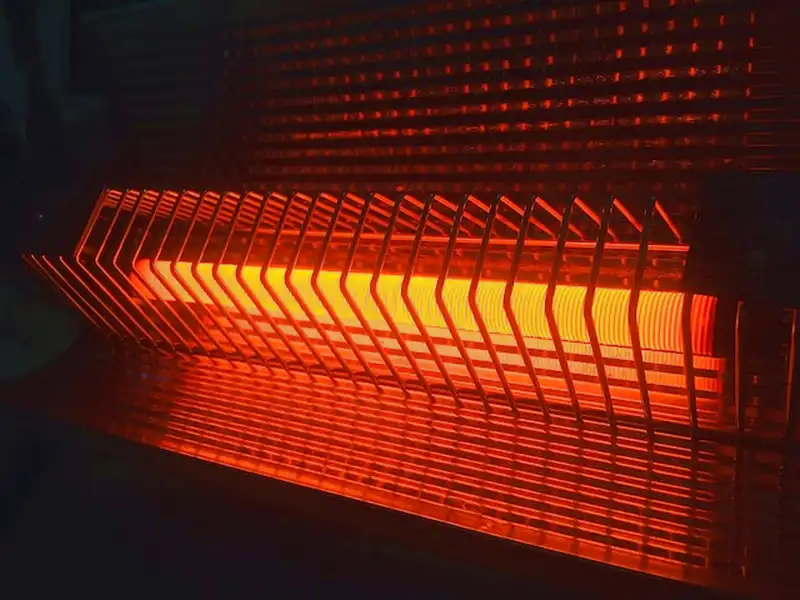 Infrared heaters use infrared rays to transfer heat directly to people and objects instead of heating the surrounding air.
