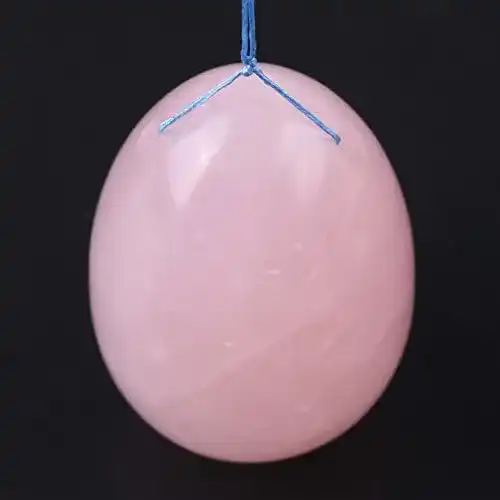 Yoni-Ei aus Rosenquarz, eiförmig und gebohrt