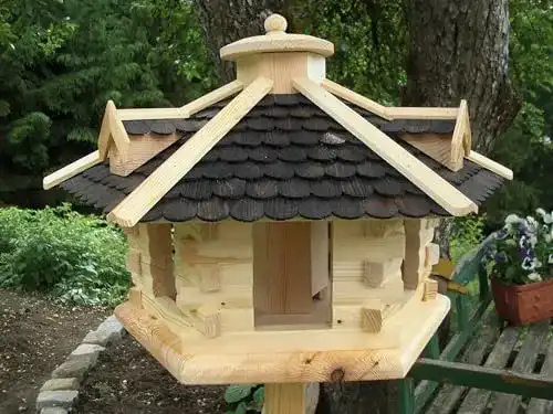 Vogelhaus aus Holz in groß mit Futterdosierer für den Garten