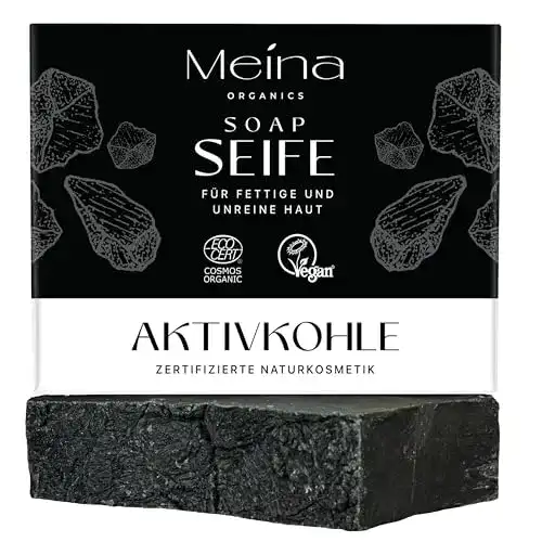 Schwarze Seife Meina mit Aktivkohle gegen Akne und Hautunreinheiten