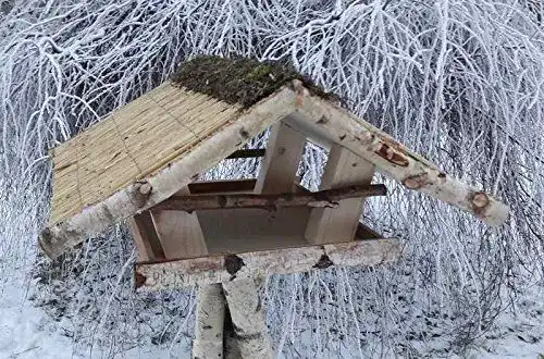 Vogelhaus mit Reetdach von Vogelhäuser-Raschen als Vogelfutterhaus